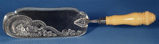 An Edwardian ivory handled silver crumb scoop, by Barker Brothers, Length; 334mm.